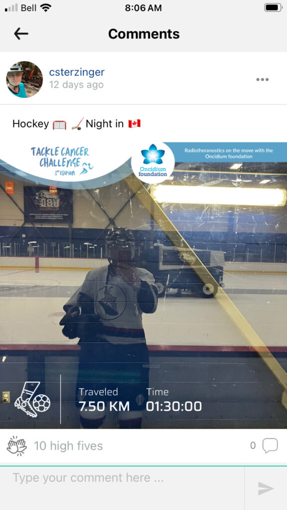 Chris Sterzinger takes a photo of himself playing hockey while participating in the Tackle Cancer challenge