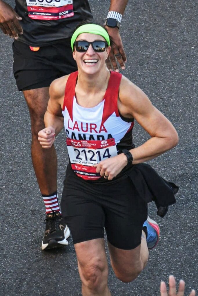 Laura Stellato is captured on camera during a marathon while participating in the Tackle Cancer challenge