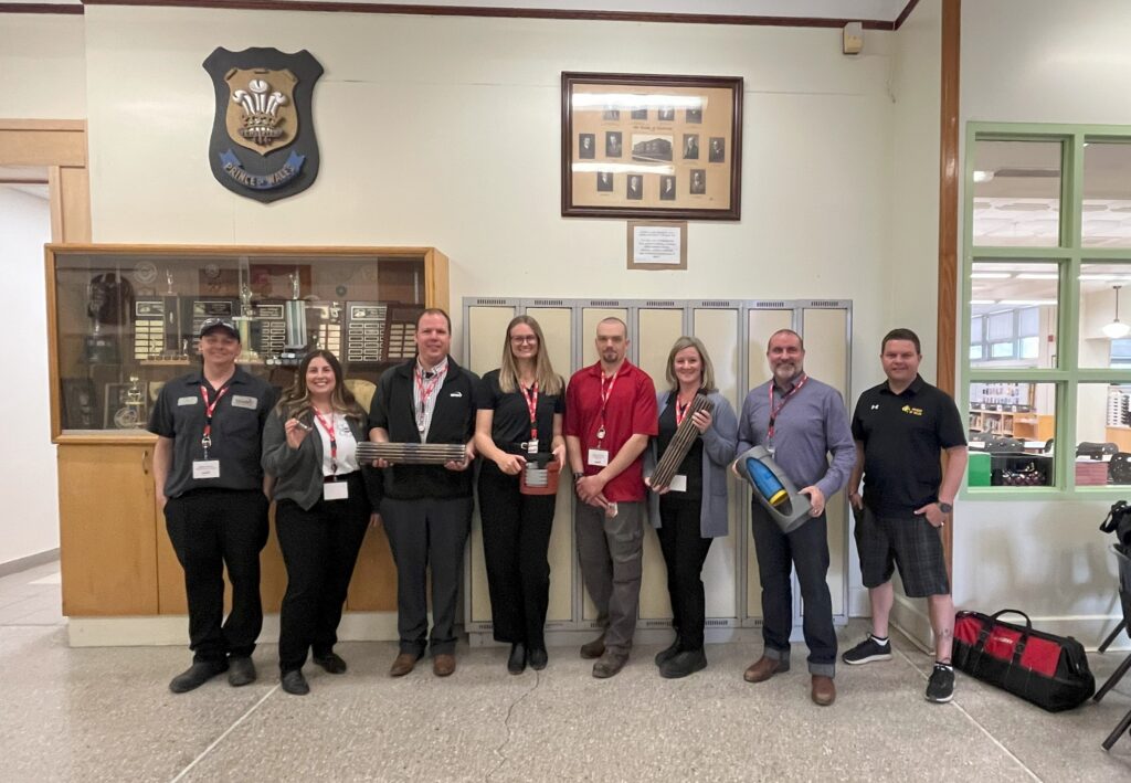 Employees at the school after delivering classroom career sessions.